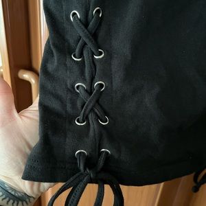 Black crop top with laced ties on the sides